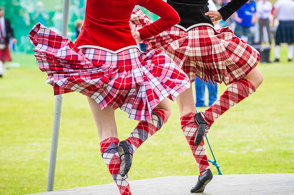 Two girls doing a Highland dance.